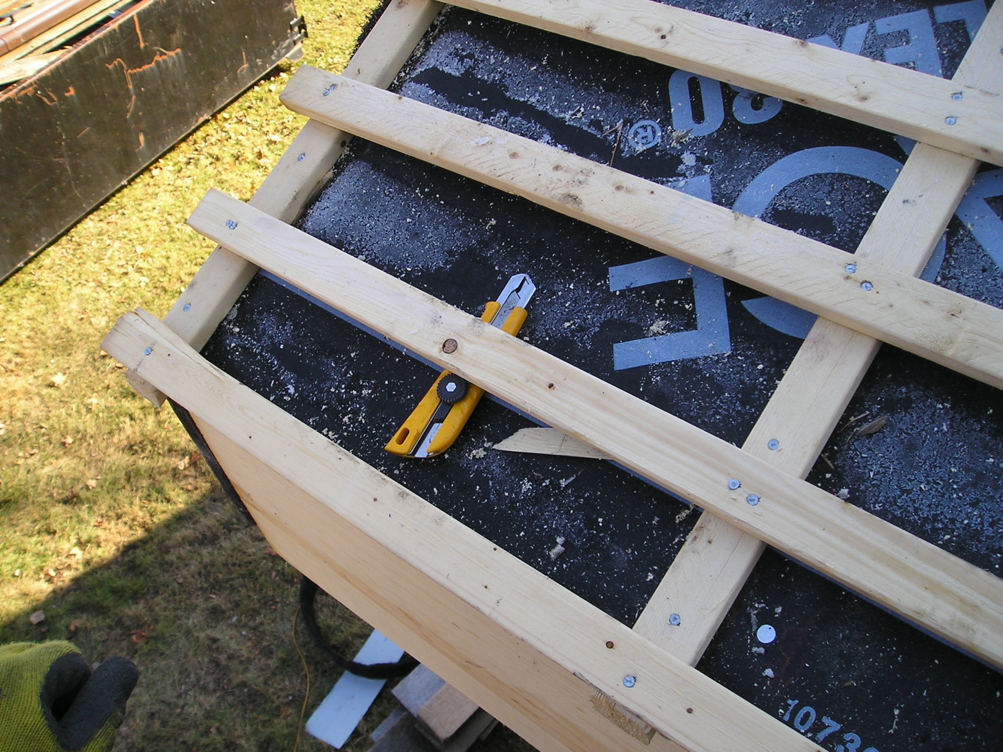 Spruce strapping grid for cedar shingle installation