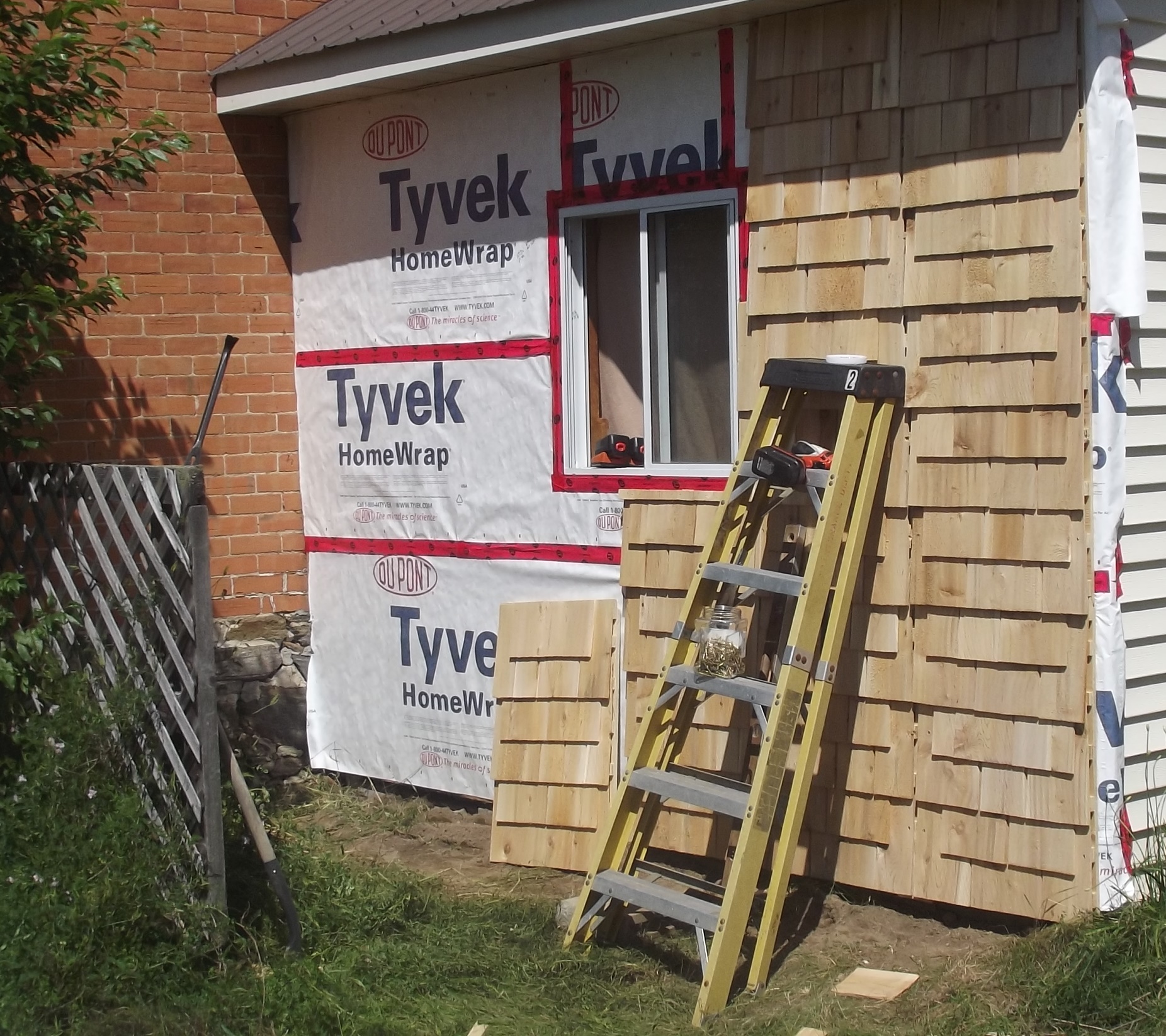 Installing cedar shingle siding panels